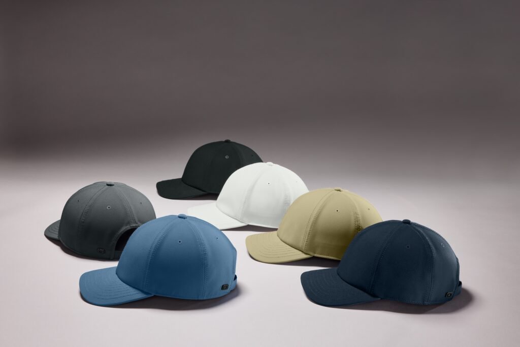 Five caps on grey surface