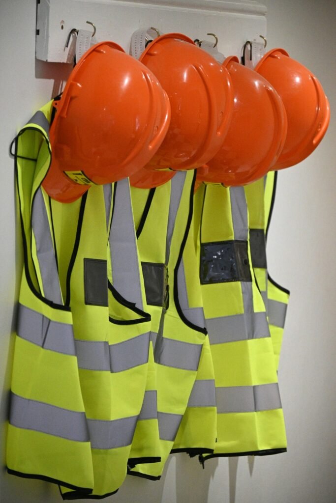 Hi-vis safety vests hanging